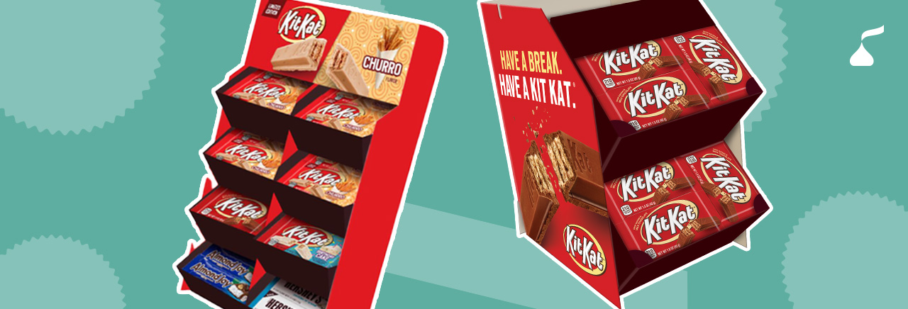 Two display stands with assorted candy bars
